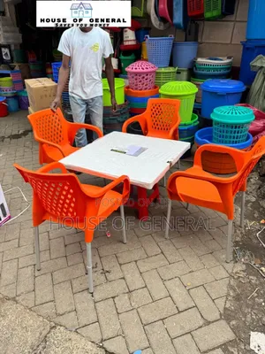 4 Plastic Chair With Metal Legs and 1 Plastic Table