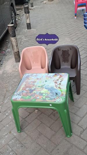Child Plastic Chairs and a Table Set - thumbnail 2
