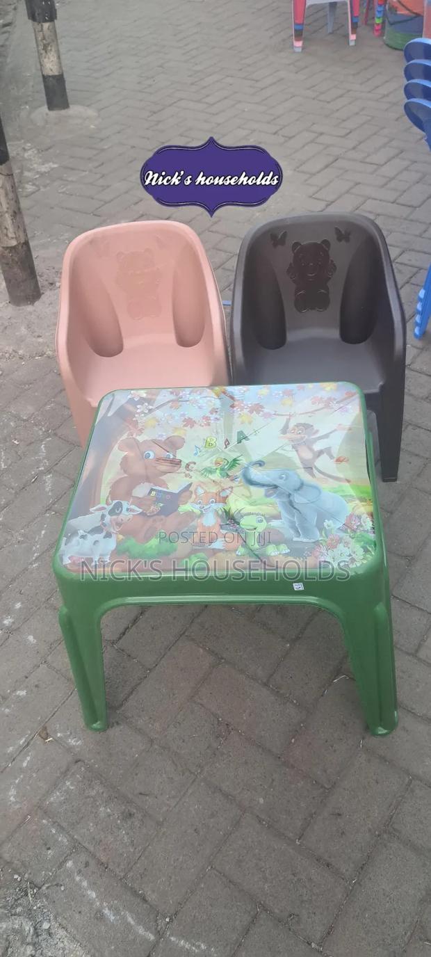 Child Plastic Chairs and a Table Set - thumbnail 3