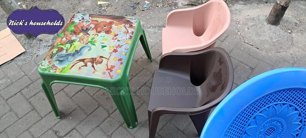 Child Plastic Chairs and a Table Set - thumbnail 4