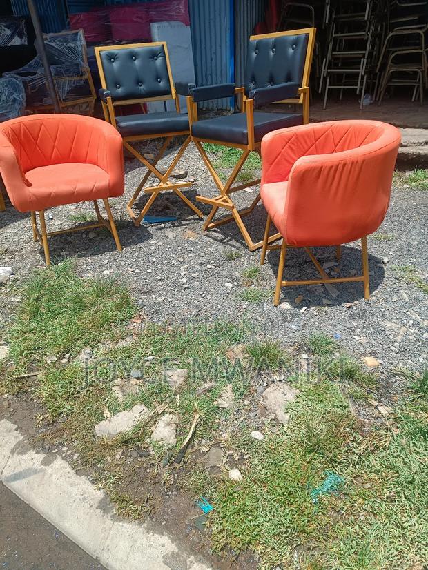 2 Orange Styling Seats and 2 Makeup Chairs - main view