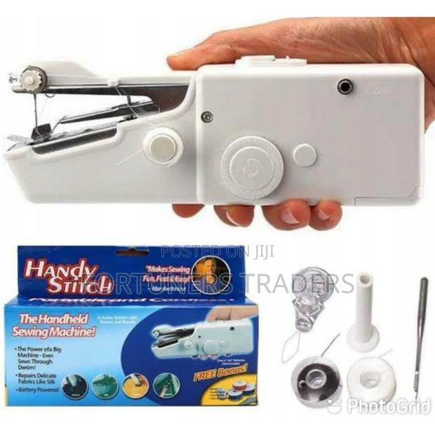 *Hand Held Sewing Machine