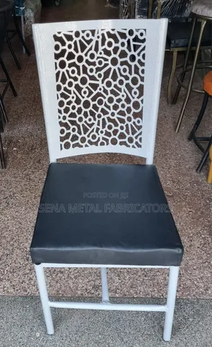 Whitish Restaurant Or Hotel Chairs.