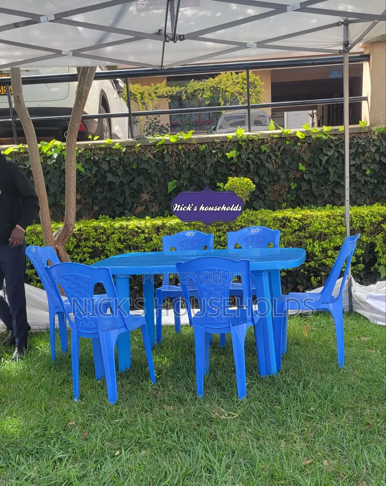 1 Plastic Table With 6 Plastic Chairs