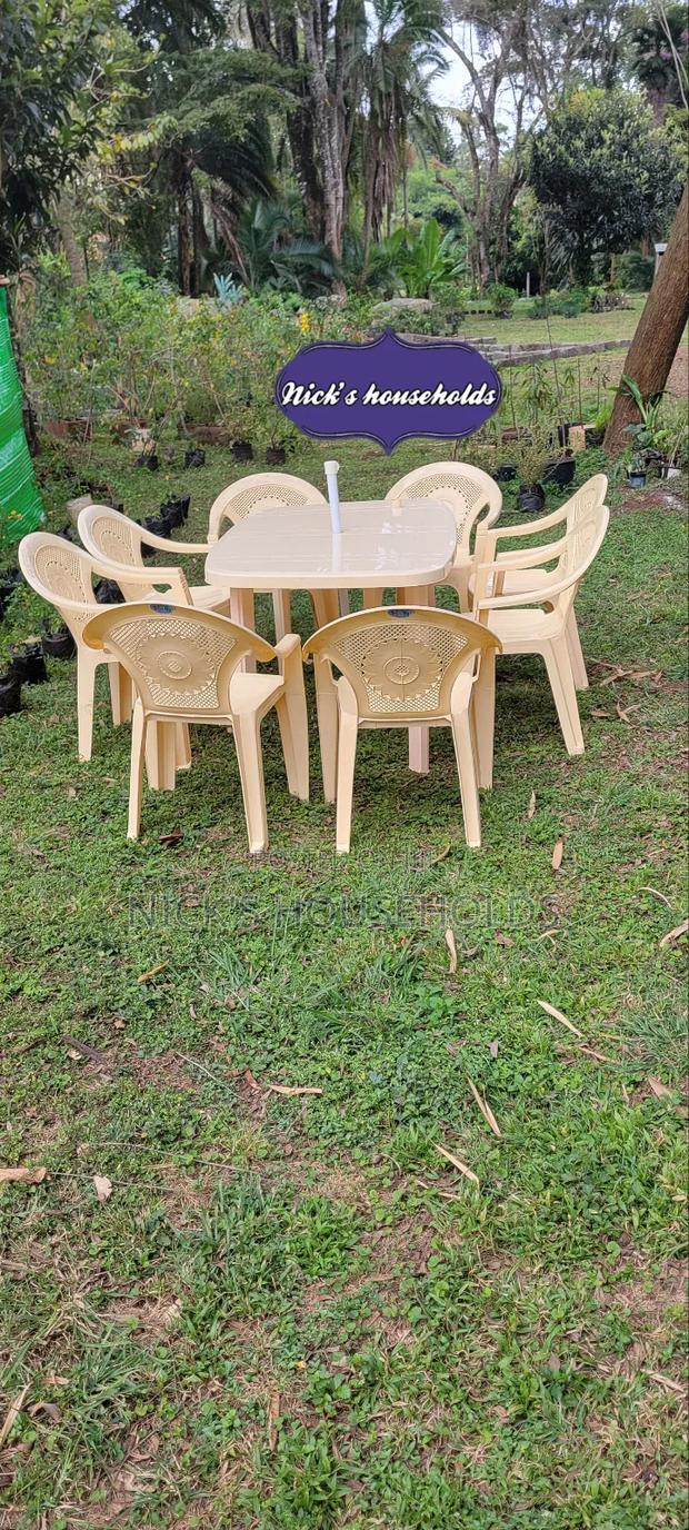 8 Kenpoly Plastic Chairs With Armrest + Plastic Table Set - main view