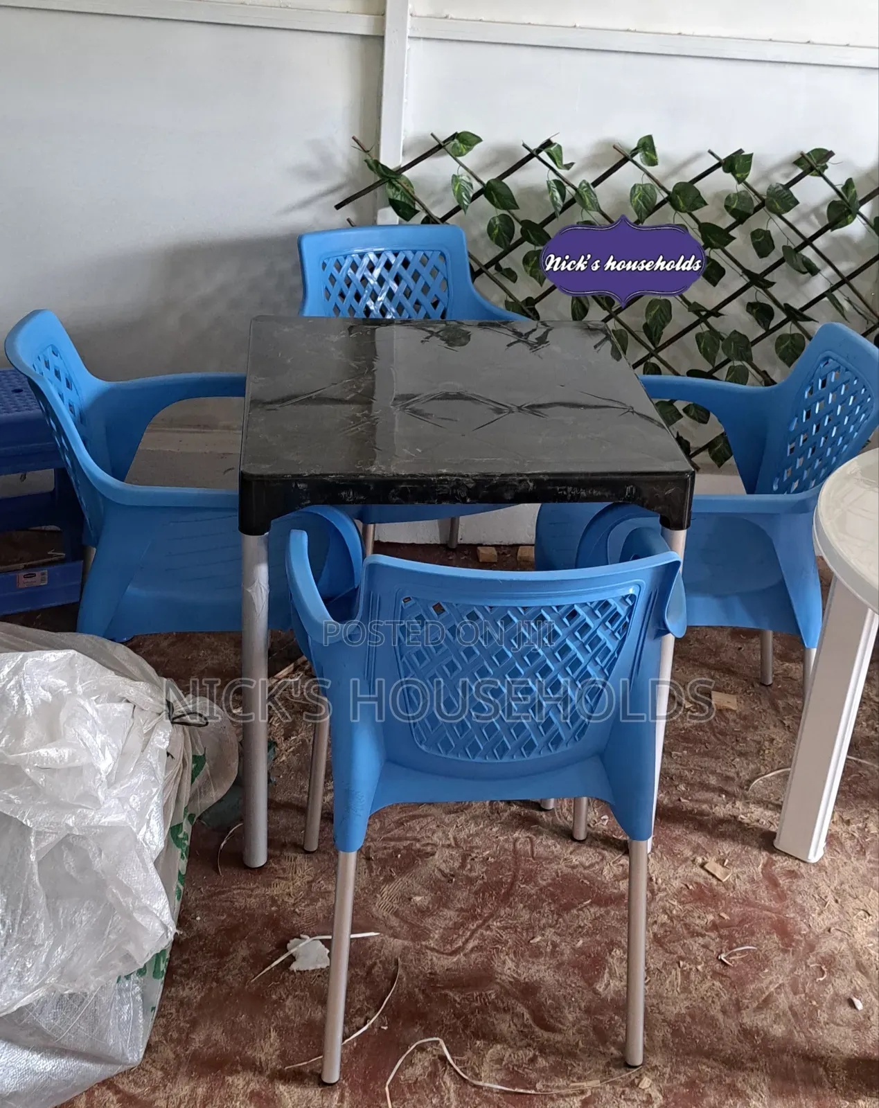 Rosa Plastic Chairs With Armrest (Blue) With a Plastic Table