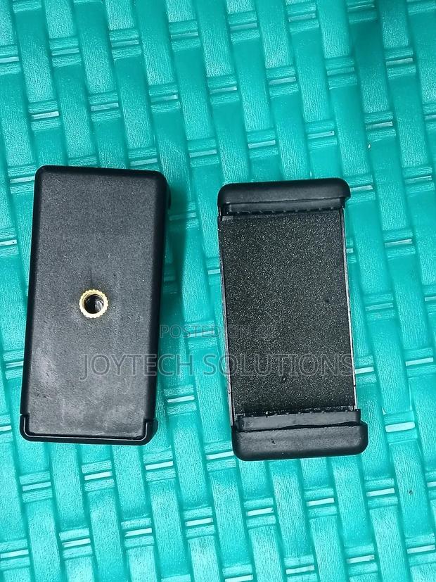 Phone Holder Clip Is Mounted on the Tripod Stand - main view