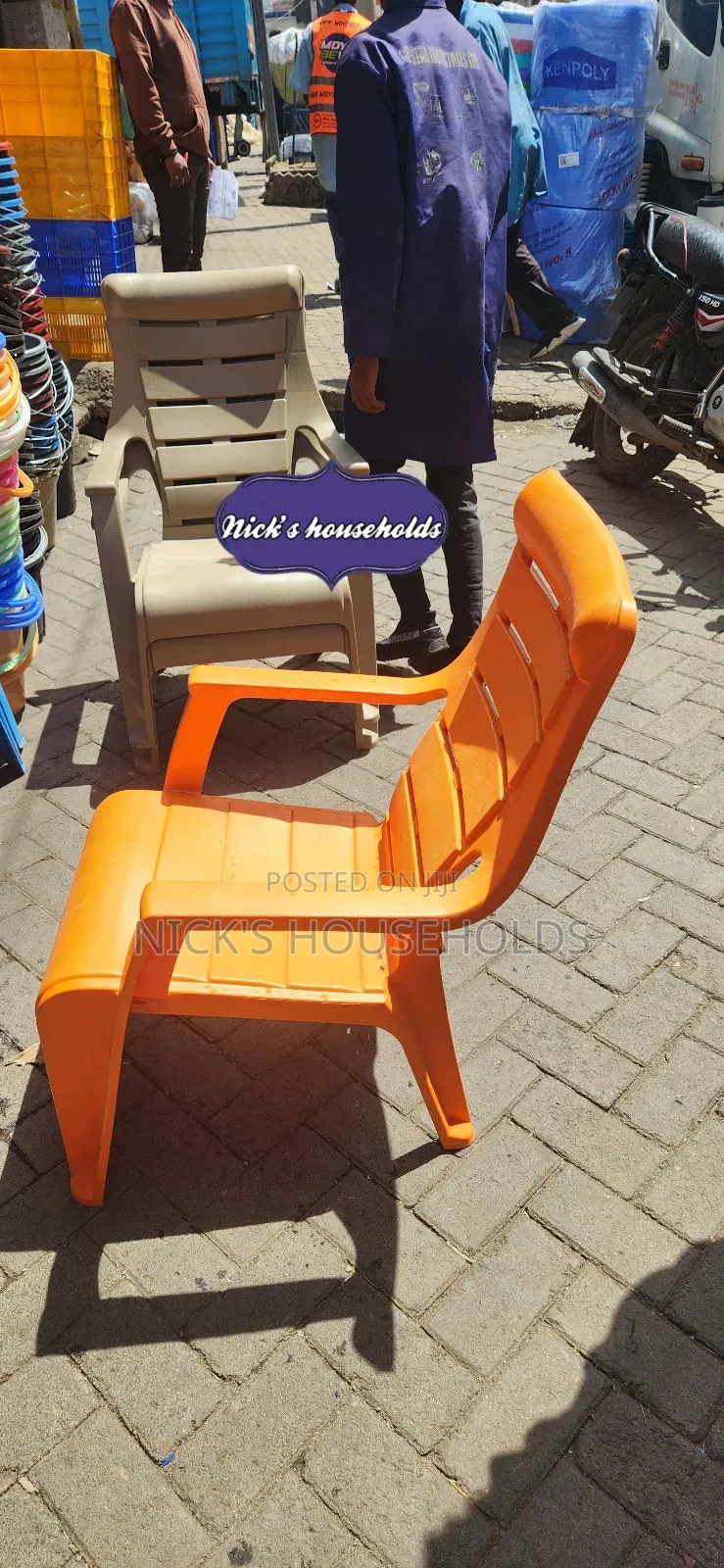 Orange Plastic Chair With Slanting Backrest
