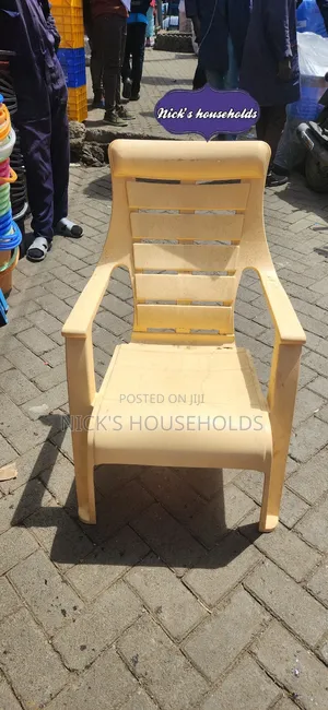 Cream Plastic Chairs With Slanting Backrest