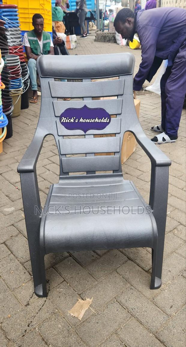 Gray Relaxing Plastic Chair With Arms and High Backrest