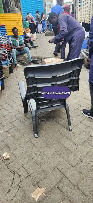 Gray Relaxing Plastic Chair With Arms and High Backrest
