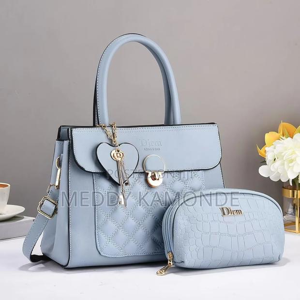 Women Sky Blue Handbags