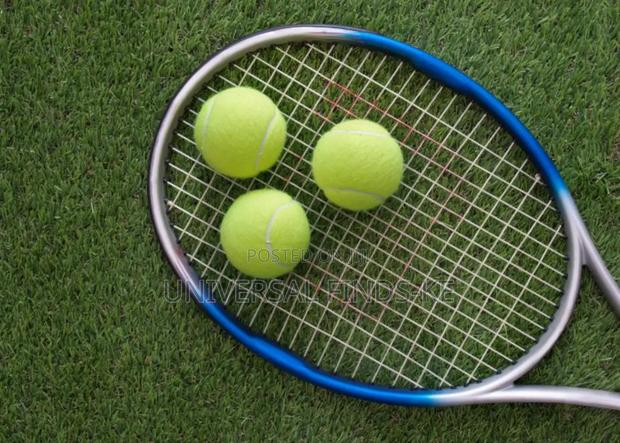 The Ultimate Tennis Racket With Green Balls - thumbnail 3