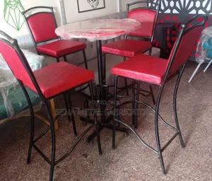 Matching Set of High Stools With a Table.