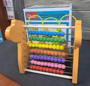 Children Counting Abacus - thumbnail 2