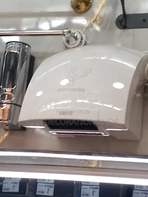 White Plastic Hand Dryer Machine