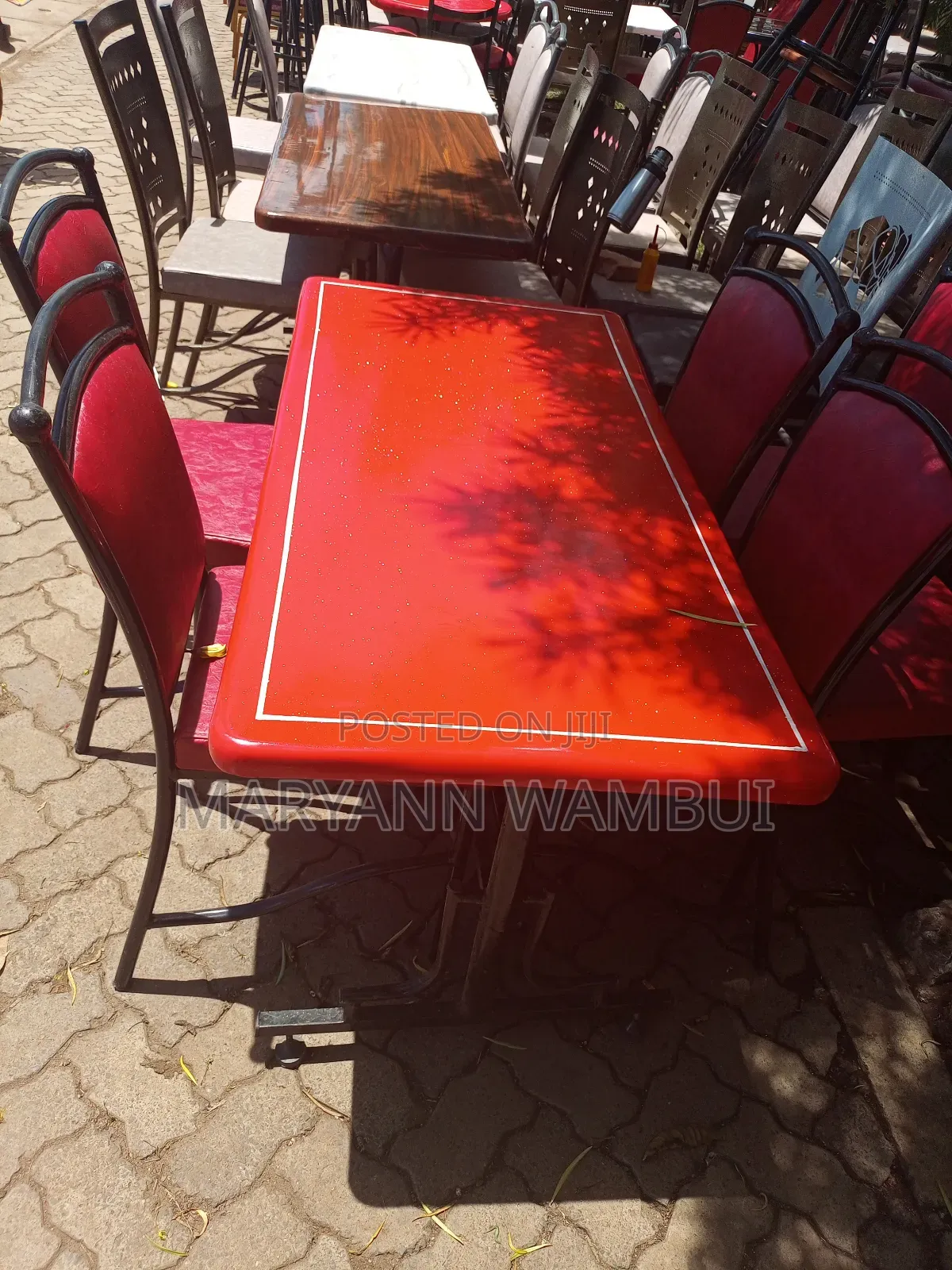 A Set of Rectangle Marble Table With Chairs