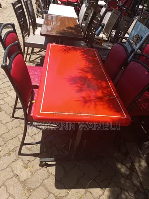 A Set of Rectangle Marble Table With Chairs