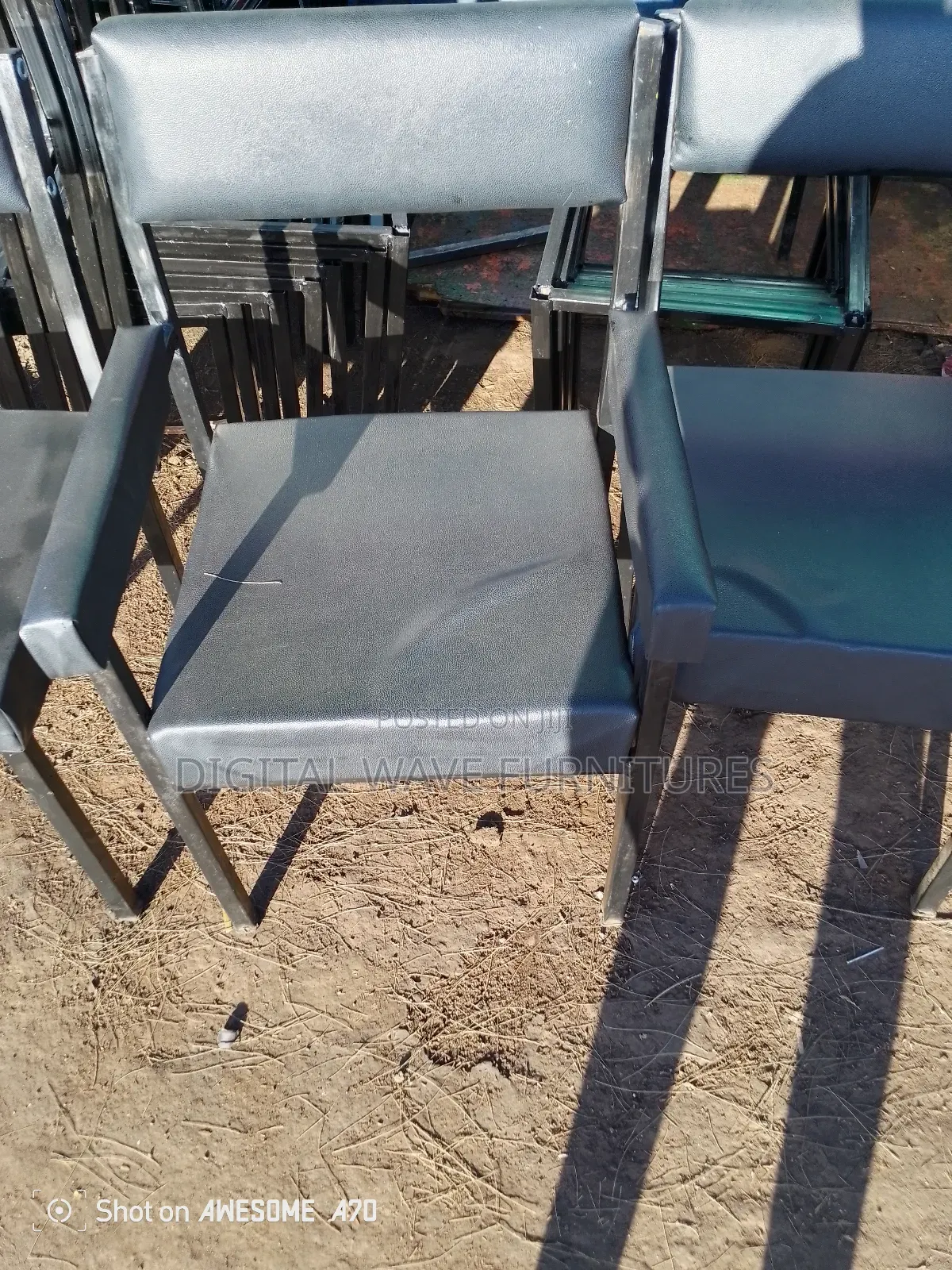 Black Waiting Chair With Hands