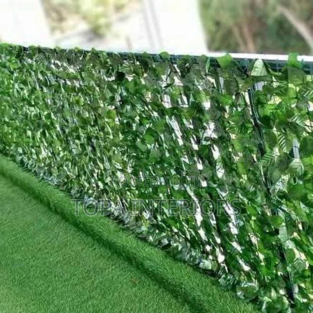 Transform Your Balcony With Artificial Green Privacy Fence