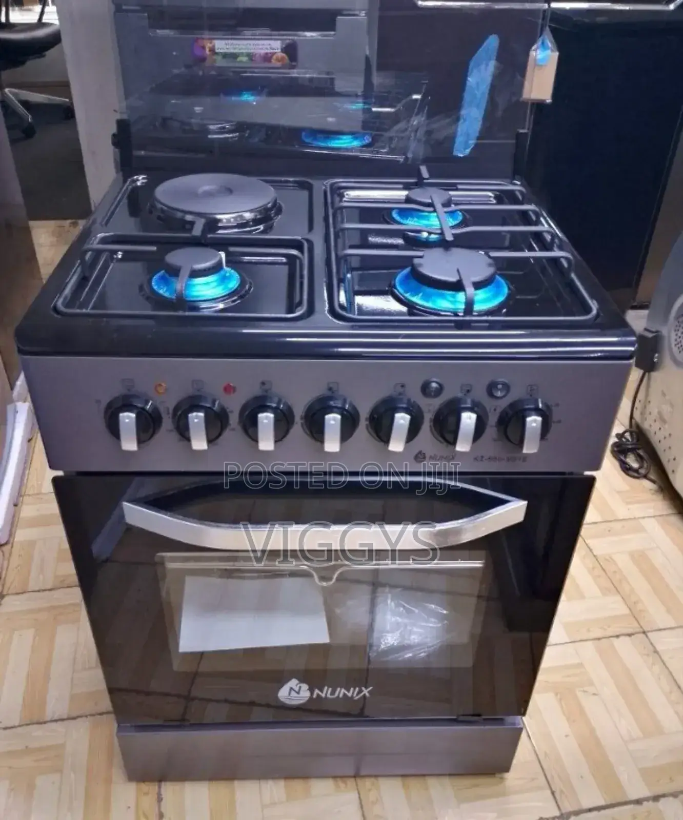 Nunix 60 by 60 Cooker With Electric Oven .