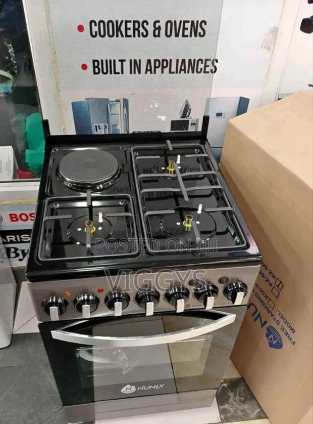 Nunix 50 by 55 Free Standing Cooker With Oven .