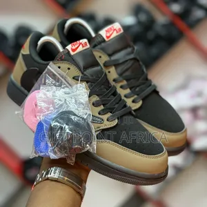 Air Jordan 1 Travis Sneakers