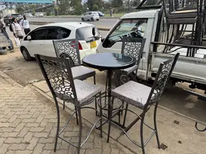 Restaurant And Bar High Mabati Chairs And Round Black Table