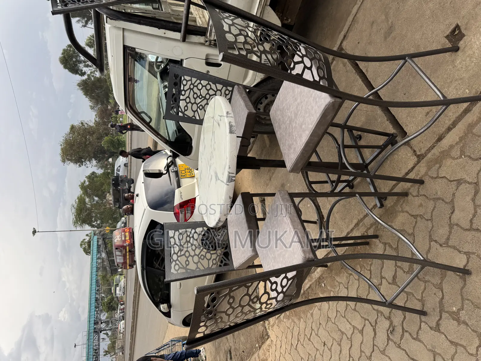 White High Round Table And High Bar Chairs