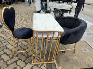 White Marble Manicure Table With Gold Chairs