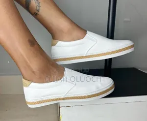 White and Black Casual Unisex Flat Rubber Shoes.