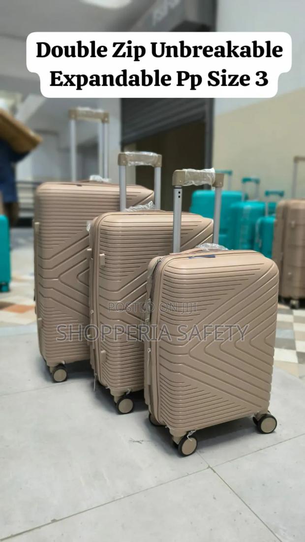 Size 3 Unbreakable Rubber Suitcase - thumbnail 2