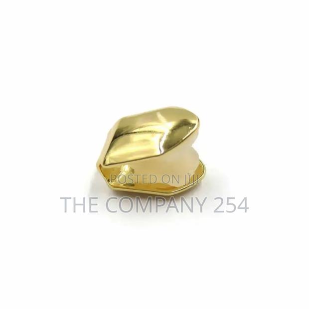 Quality Silver and Gold Temporary Tooth Grills Available - thumbnail 4