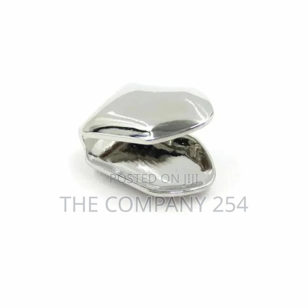 Quality Silver and Gold Temporary Tooth Grills Available - thumbnail 5