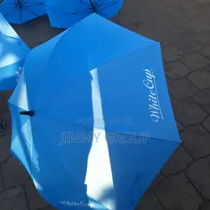 White Cap Blue Umbrellas