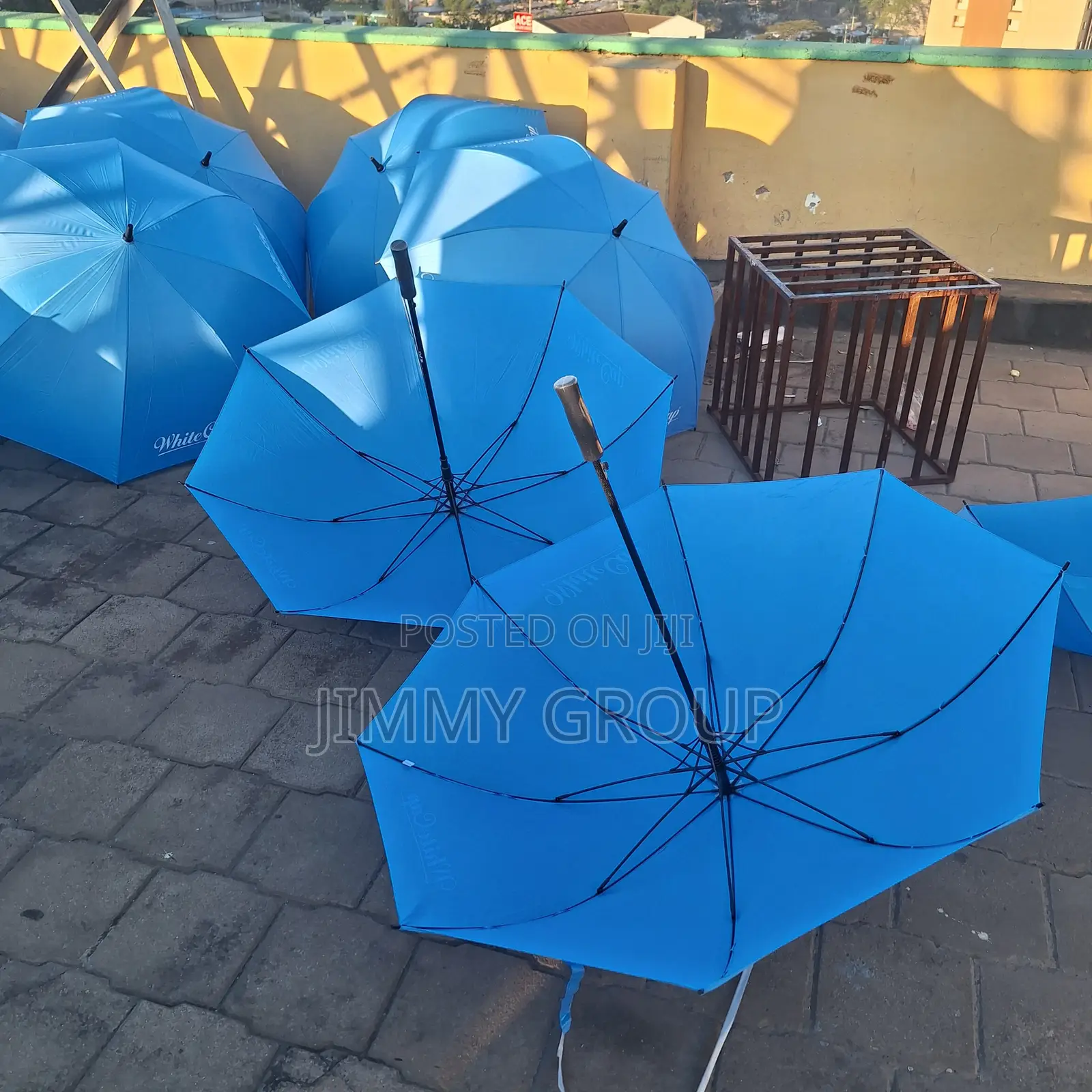 White Cap Blue Umbrellas