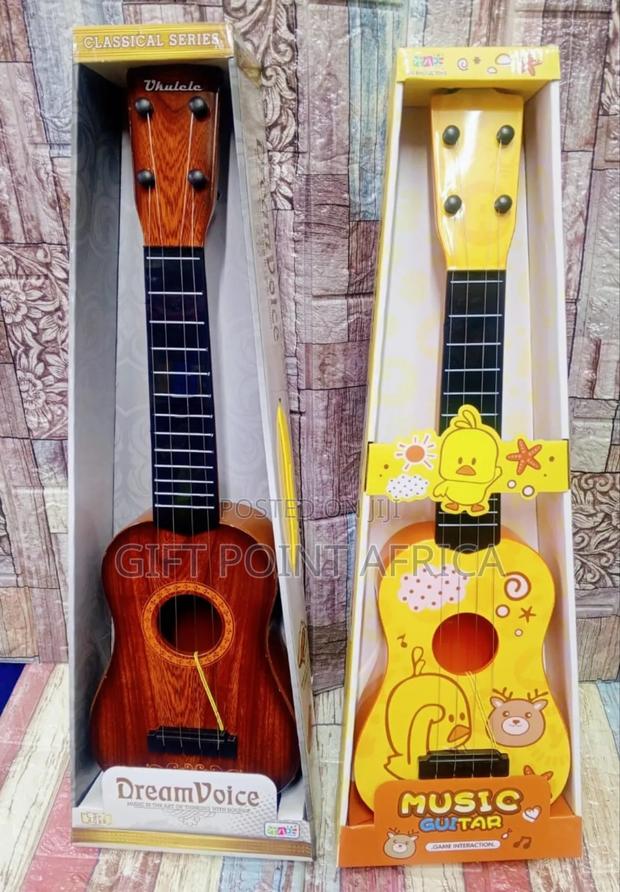 4 String Kids Guitar - main view