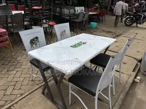 Restaurant And Bar Coated Chairs And White Table