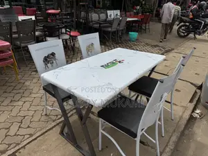 Restaurant And Bar Coated Chairs And White Table