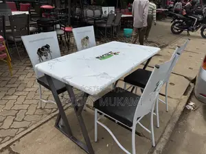 Restaurant And Bar Coated Chairs And White Table
