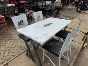 Restaurant And Bar Coated Chairs And White Table