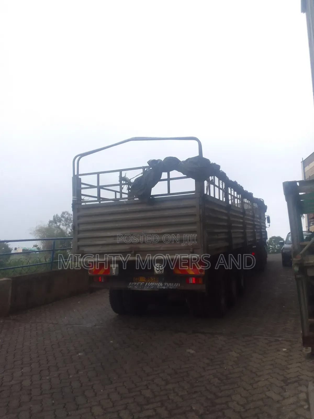 High Sided Trailer With Tarpaulin Available for Transport