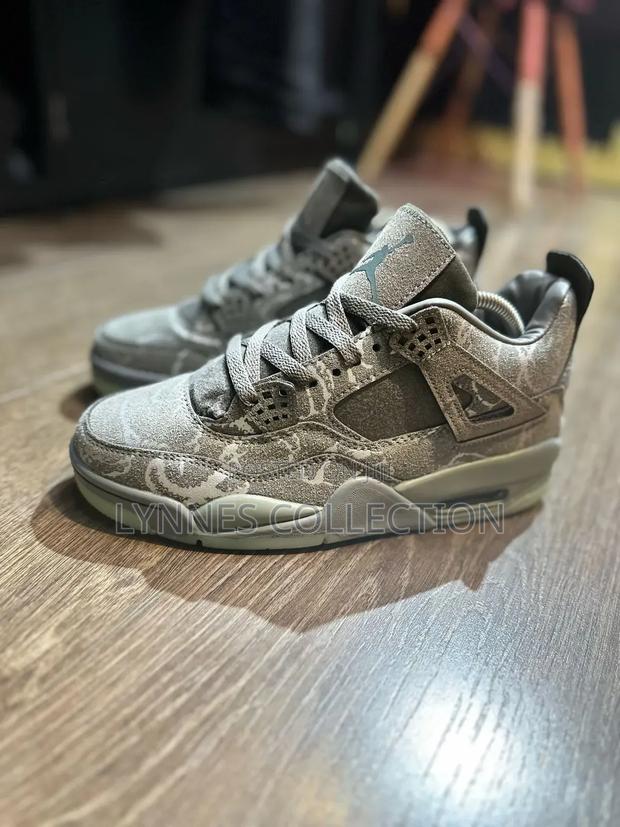 Jordan 4 Retro Kaws - thumbnail 2