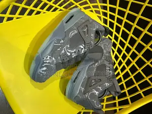 Jordan 4 Retro Kaws