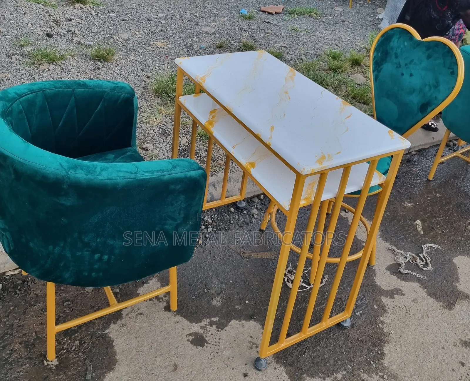 Gold Manicure Set With Green Fabric Upholstery.