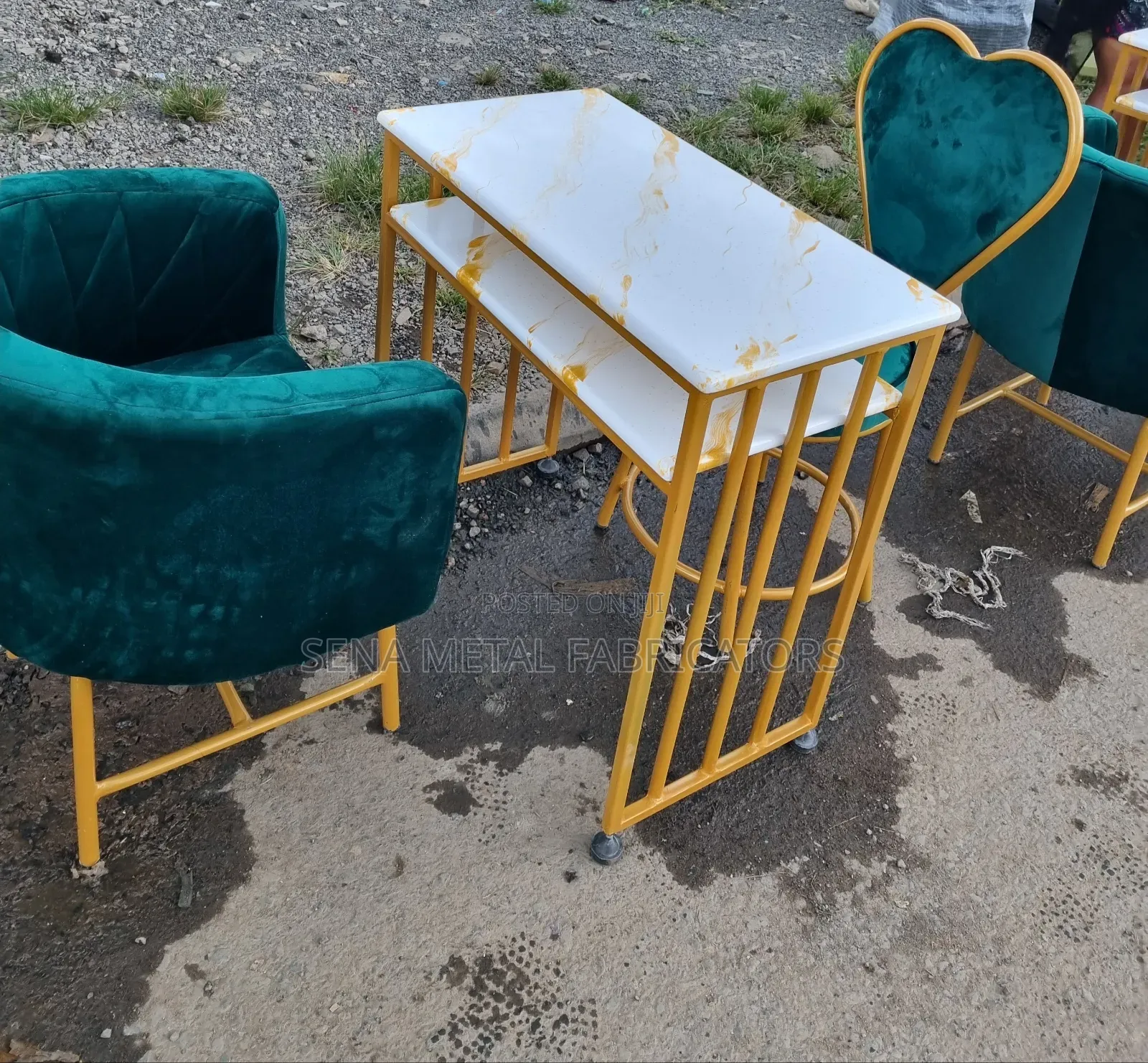 Gold Manicure Set With Green Fabric Upholstery.