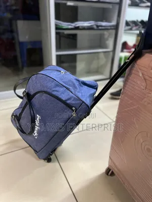 Navy Blue  Duffel Trolley Bags With Wheels at 2500