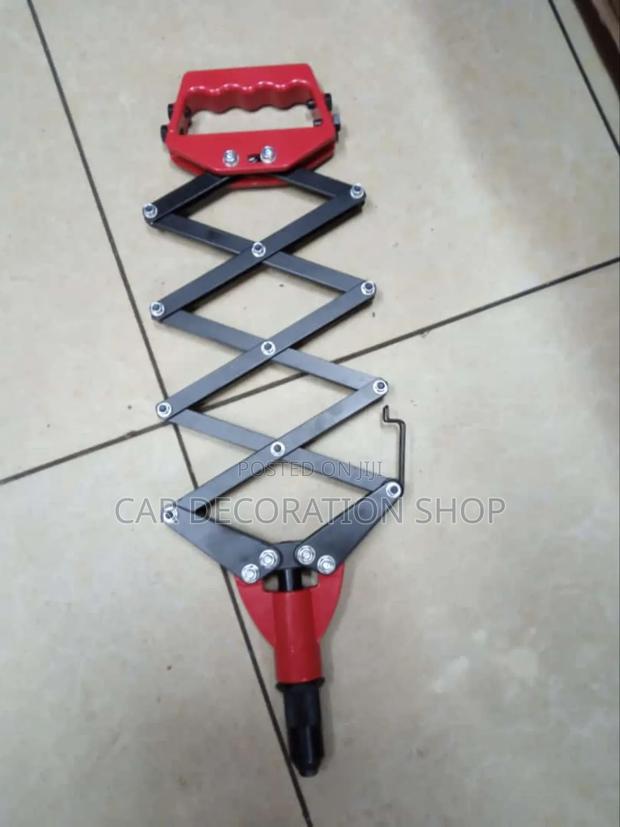 Brand New Red Rivert Gun - main view