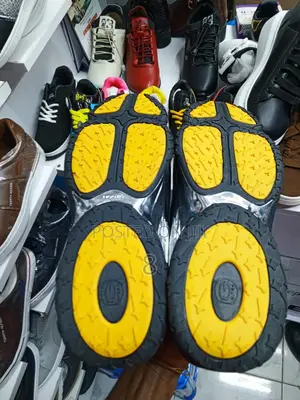 Drake’S Signature Nocta Glide – Limited Edition Sneakers