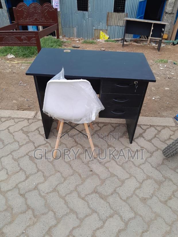 Grey Office Desk And White Eames Chair - main view